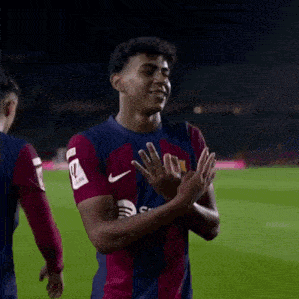 Soccer Player in Number 8 Jersey Clapping