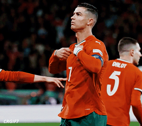 Soccer Player in Orange Jersey Number 5