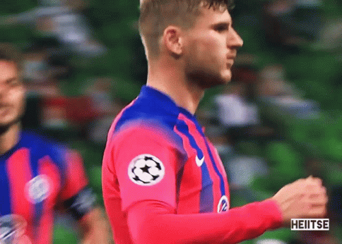 Soccer Player In Pink And Blue Jersey With Soccer Ball GIF