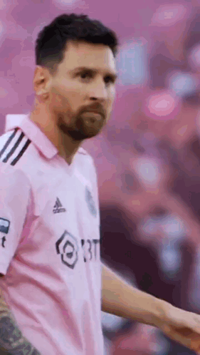 Soccer Player in Pink Jersey on Field