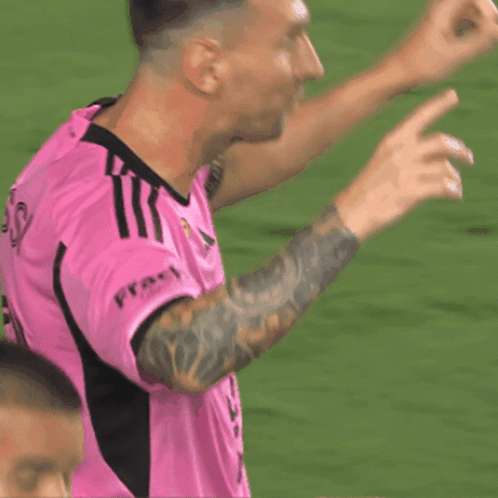 Soccer Player in Pink Jersey with Fract