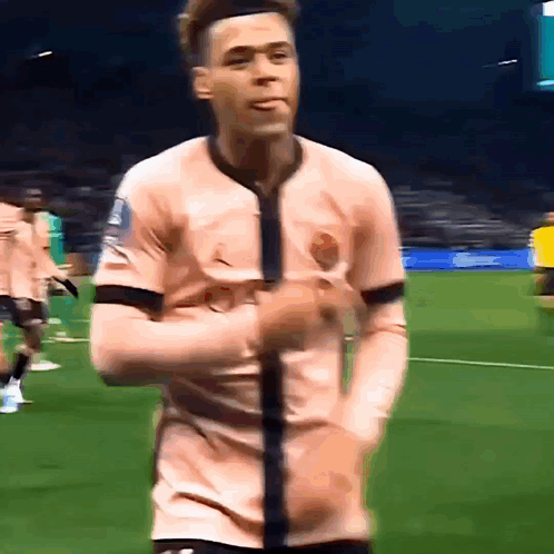 Soccer Player in Pink Jordan Jersey