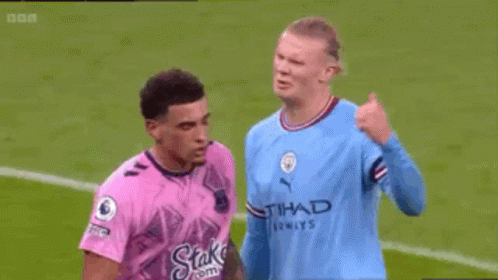 Soccer Player In Pink Shirt Saying Stake GIF