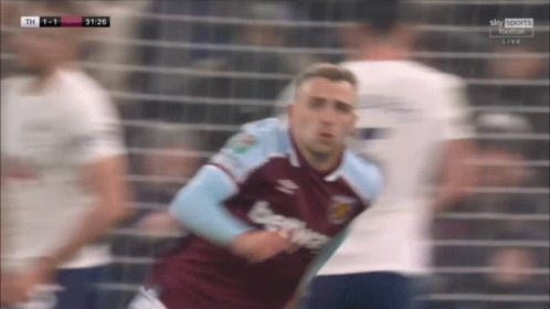 Soccer Player in Purple and Blue Jersey