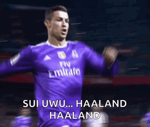 Soccer Player in Purple Fly Emirates Jersey Celebrating