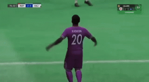 Soccer Player in Purple Jersey Celebrating Goal