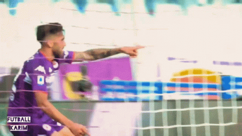 Soccer Player In Purple Jersey Number 9 GIF