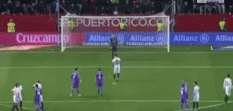 Soccer Player in Purple Jersey on Soccer Field