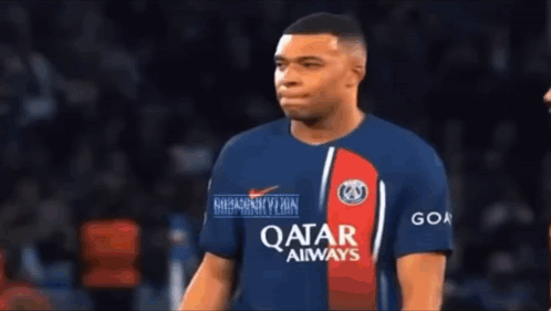 Soccer Player in Qatar Airways Jersey
