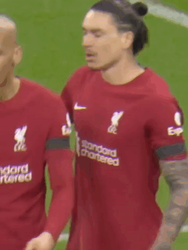 Soccer Player in Red #6 Talking to Another Player
