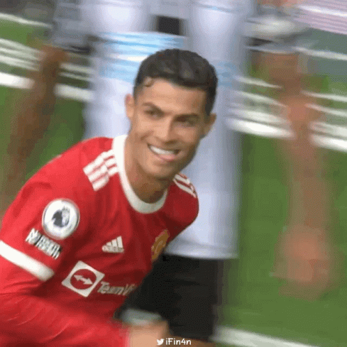 Soccer Player in Red Adidas Jersey Smiling