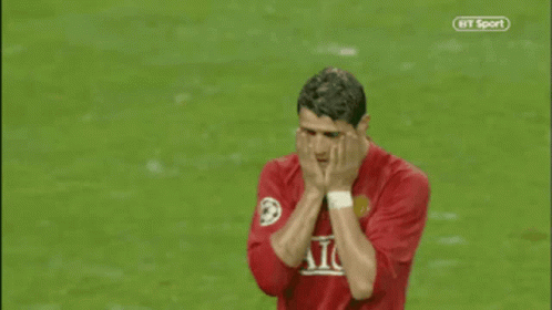 Soccer Player in Red AIG Jersey