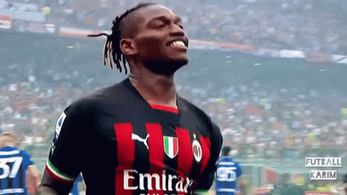 Soccer Player In Red And Black Jersey Emirates Fly Better GIF
