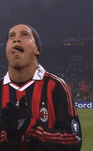 Soccer Player In Red And Black Striped Adidas Jersey GIF