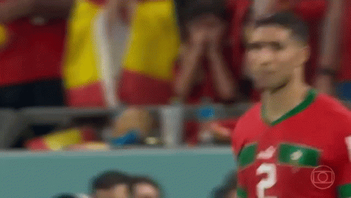 Soccer Player In Red And Green Jersey GIF