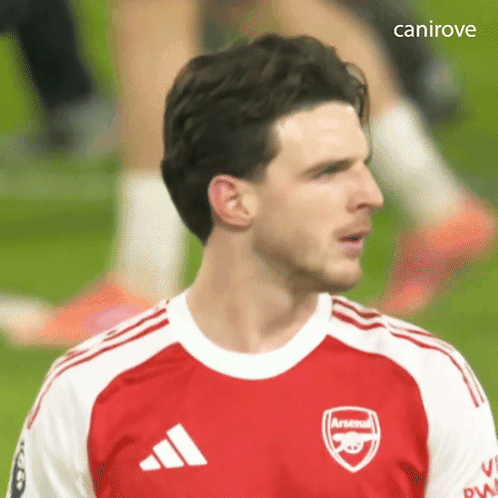 Soccer Player in Red and White Arsenal Jersey