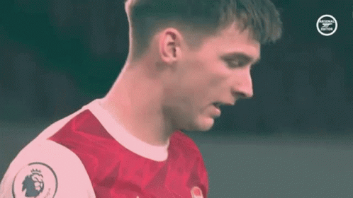 Soccer Player in Red and White Jersey Close-Up