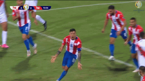 Soccer Player in Red and White Jersey Number 15