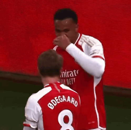 Soccer Player in Red and White Jersey Number 9