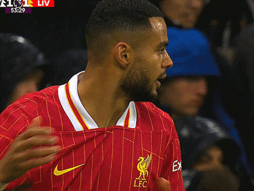 Soccer Player in Red and White Striped Jersey LFC