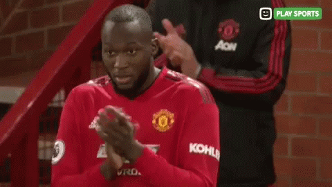 Soccer Player in Red Chevrolet Shirt Clapping