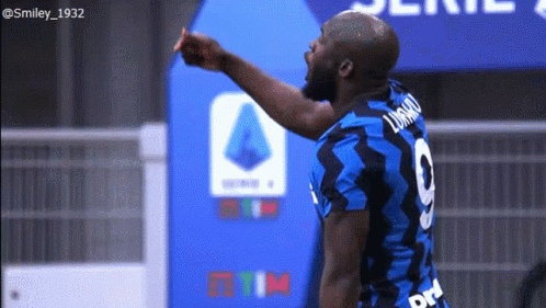 Soccer Player in Red Chevrolet Shirt Clapping