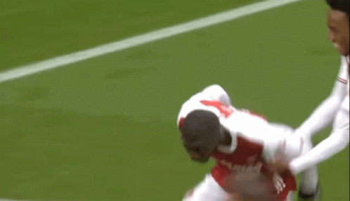 Soccer Player In Red Emirates Fly Better Jersey Running GIF