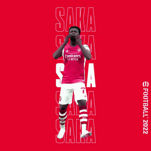 Soccer Player in Red Emirates Shirt