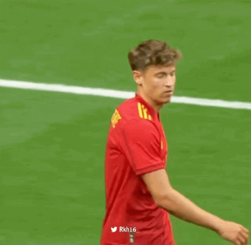 Soccer Player in Red Jersey Number 16