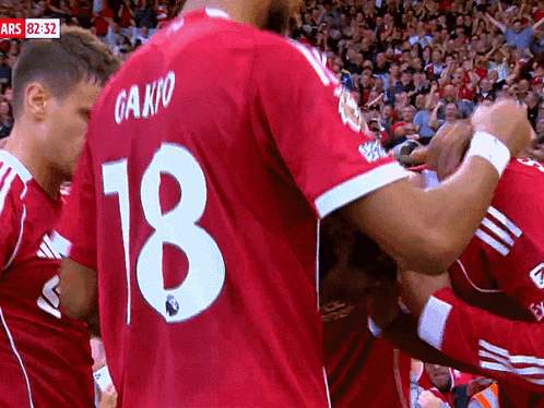 Soccer Player in Red Jersey Number 18