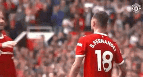 Soccer Player in Red Jersey Number 18