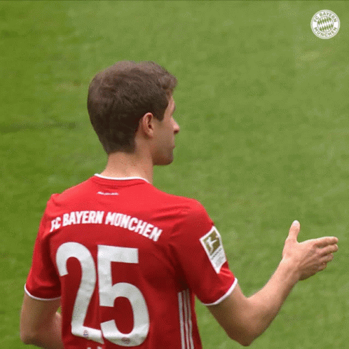 Soccer Player in Red Jersey Number 25