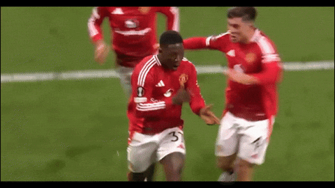 Soccer Player in Red Jersey Number 3