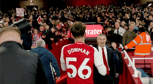Soccer Player in Red Jersey Number 56