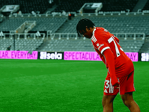Soccer Player in Red Jersey Number 7
