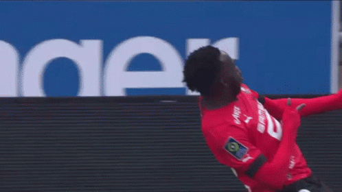 Soccer Player in Red Jersey Number 8