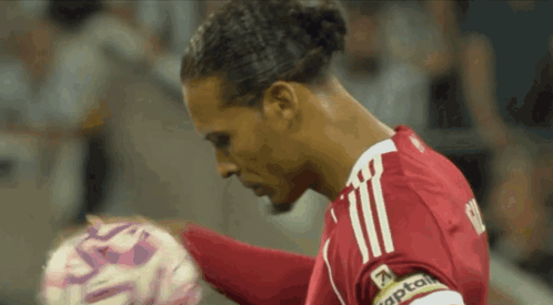 Soccer Player in Red Jersey Saying Captain