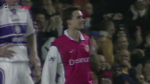 Soccer Player in Red Jersey Saying Dream