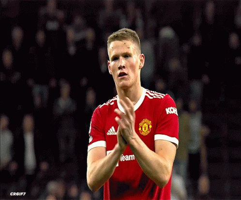 Soccer Player in Red Jersey Saying Koh