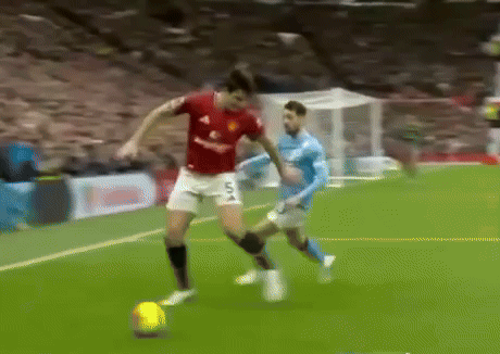 Soccer Player in Red Jersey Saying United
