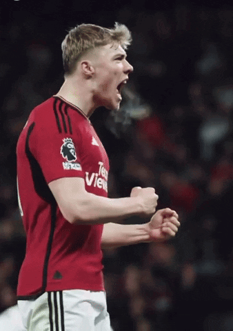Soccer Player in Red Jersey Team View