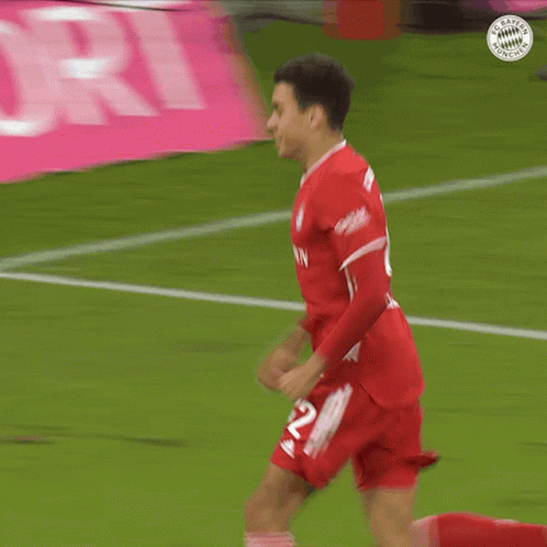 Soccer Player in Red Jersey with Number 12