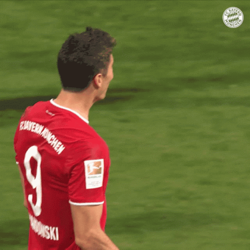 Soccer Player in Red Jersey With Number 5
