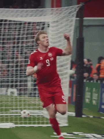 Soccer Player in Red Jersey With Number 9