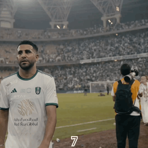 Soccer Player in Red Sea Global Shirt