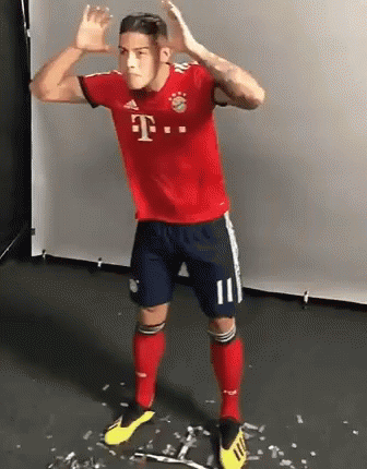 Soccer Player In Red Shirt And Blue Shorts GIF