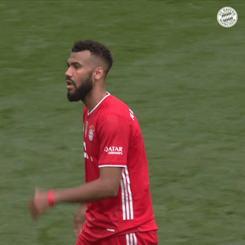 Soccer Player in Red Shirt Number 13