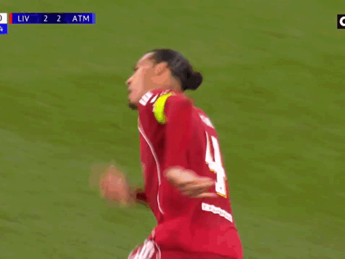 Soccer Player In Red Shirt Number 4 GIF