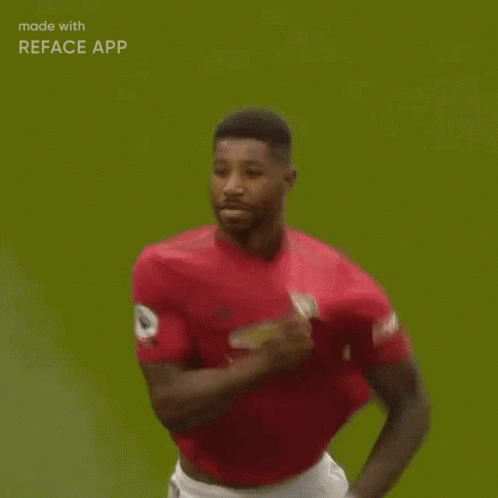 Soccer Player in Red Shirt Running