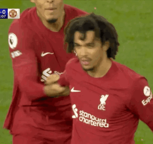 Soccer Player in Red Shirt Standard Chartered